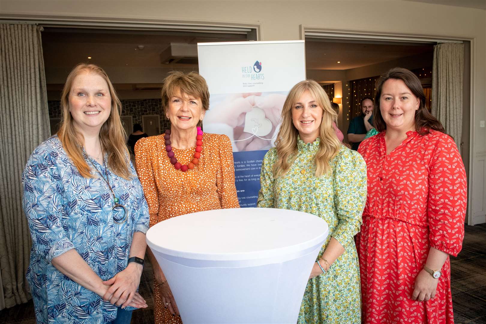 Victoria Erasmus, co-owner of the Glen Mhor Hotel; the charity's Marina Huggett; Nicola Welsh, CEO; and care supporter Lindsay Donaldson. Picture: Callum Mackay