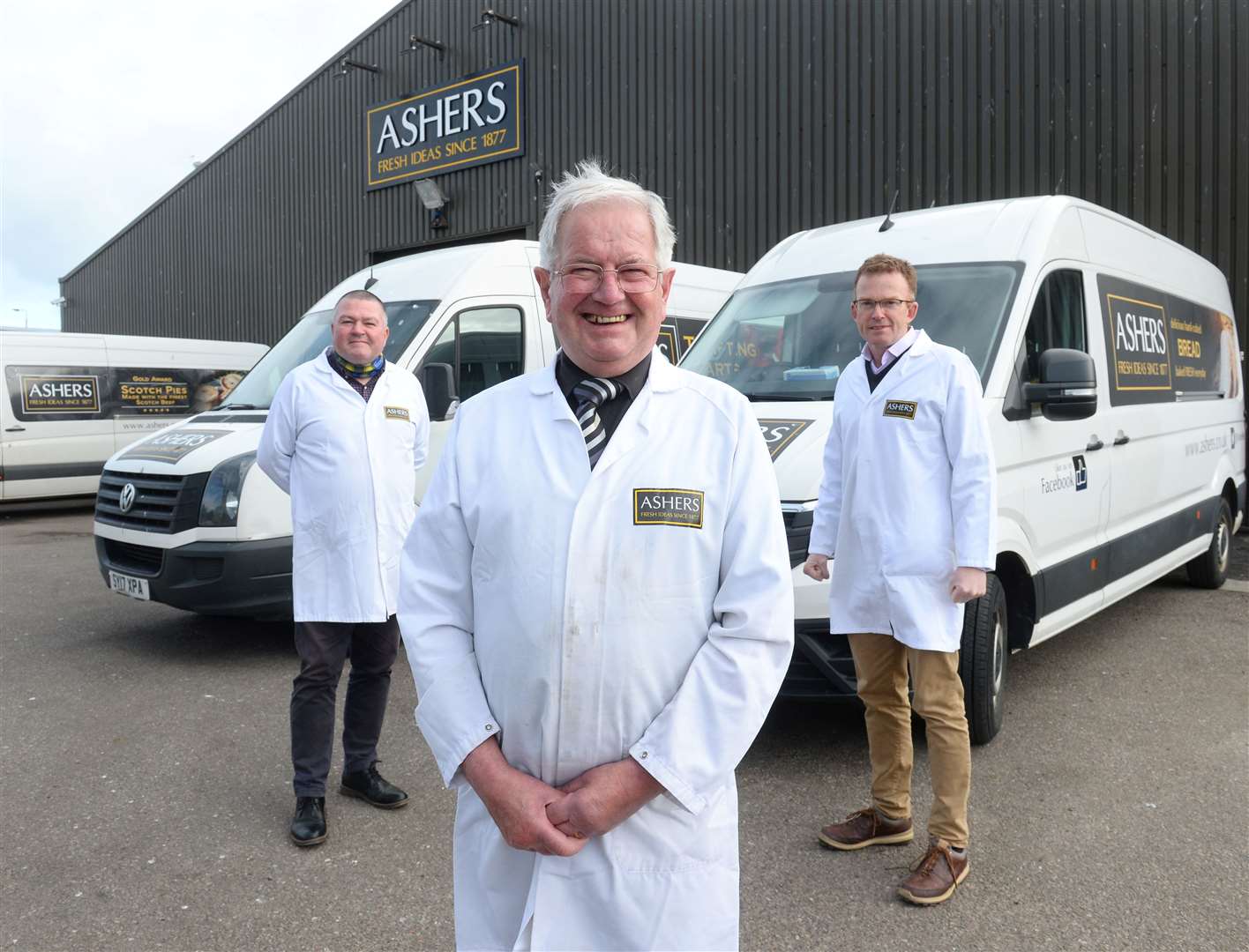 Ashers' Robbie Sommerville, who has work at the bakery for 40years, with owners Ali Asher, left, and George Asher. Picture: Gary Anthony