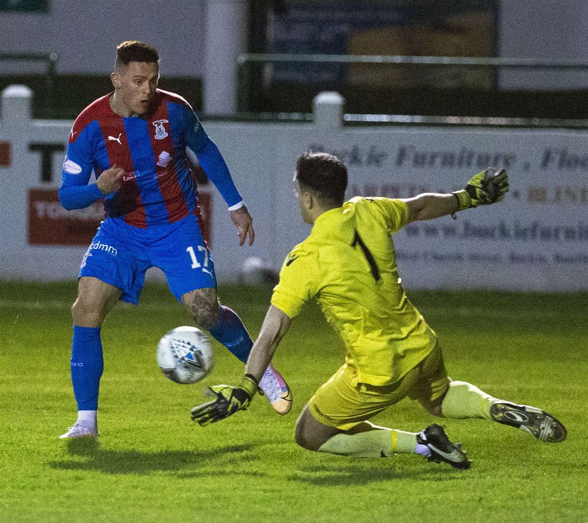 Miles Storey came close to scoring against Buckie on multiple occasions, getting denied this time by goalkeeper Daniel Bell. Picture: Ken Macpherson