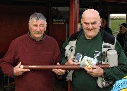 Club vice-president Billy Orrock (left) presents prizes for the heaviest fish to Stewart Dickie.
