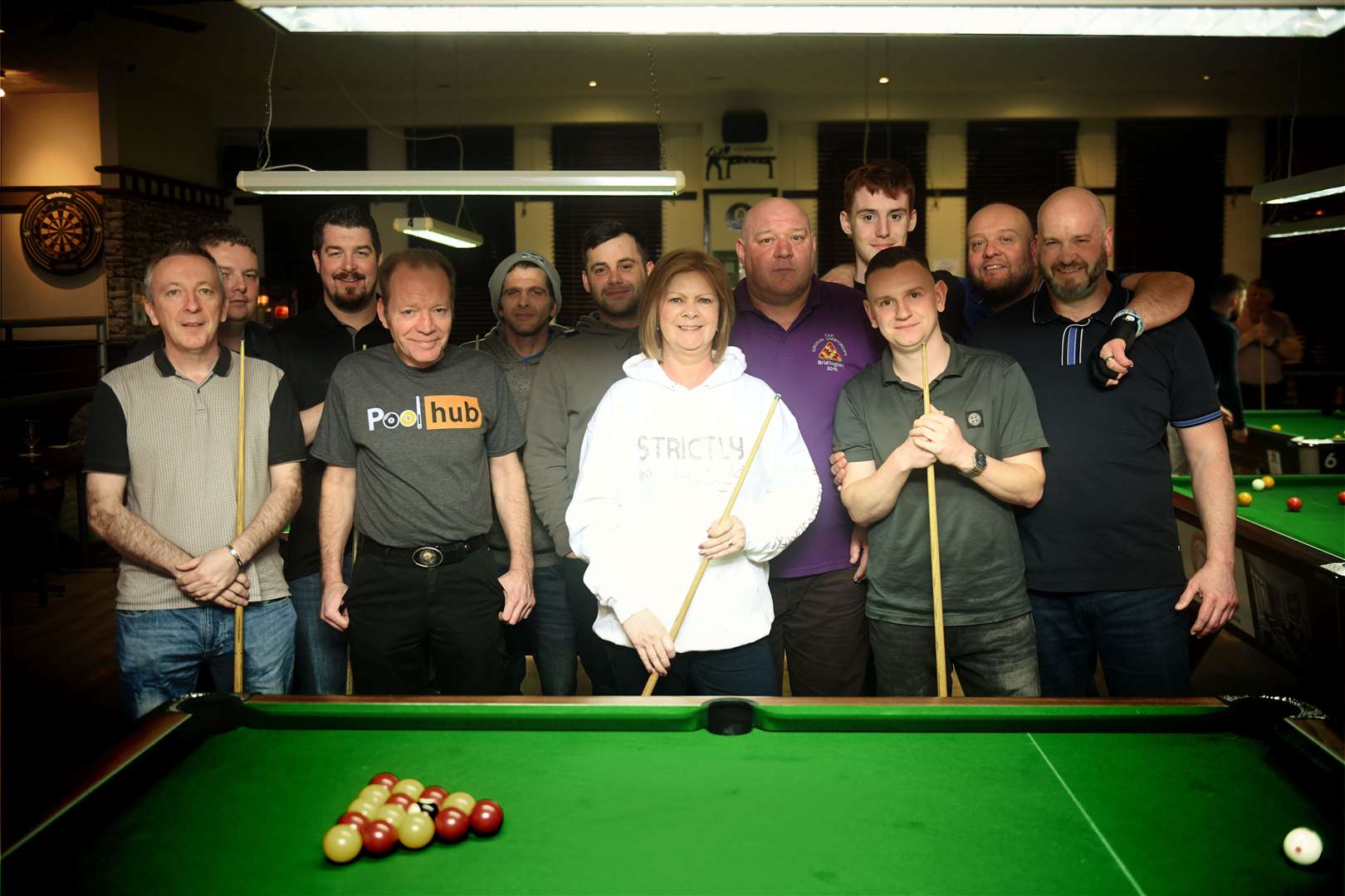 Jacqui Crawford with the participants of the pool competition. Picture: James Mackenzie.