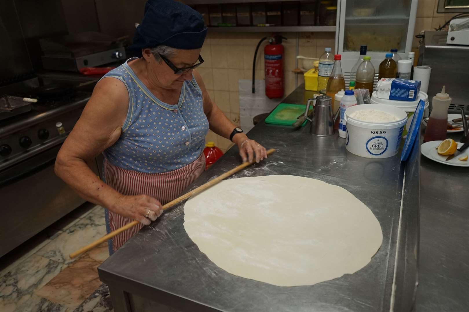 Mrs Tassia making cheese pie at Tassia's, Alonnisos. Picture: PA Photo/Jonathan Williams