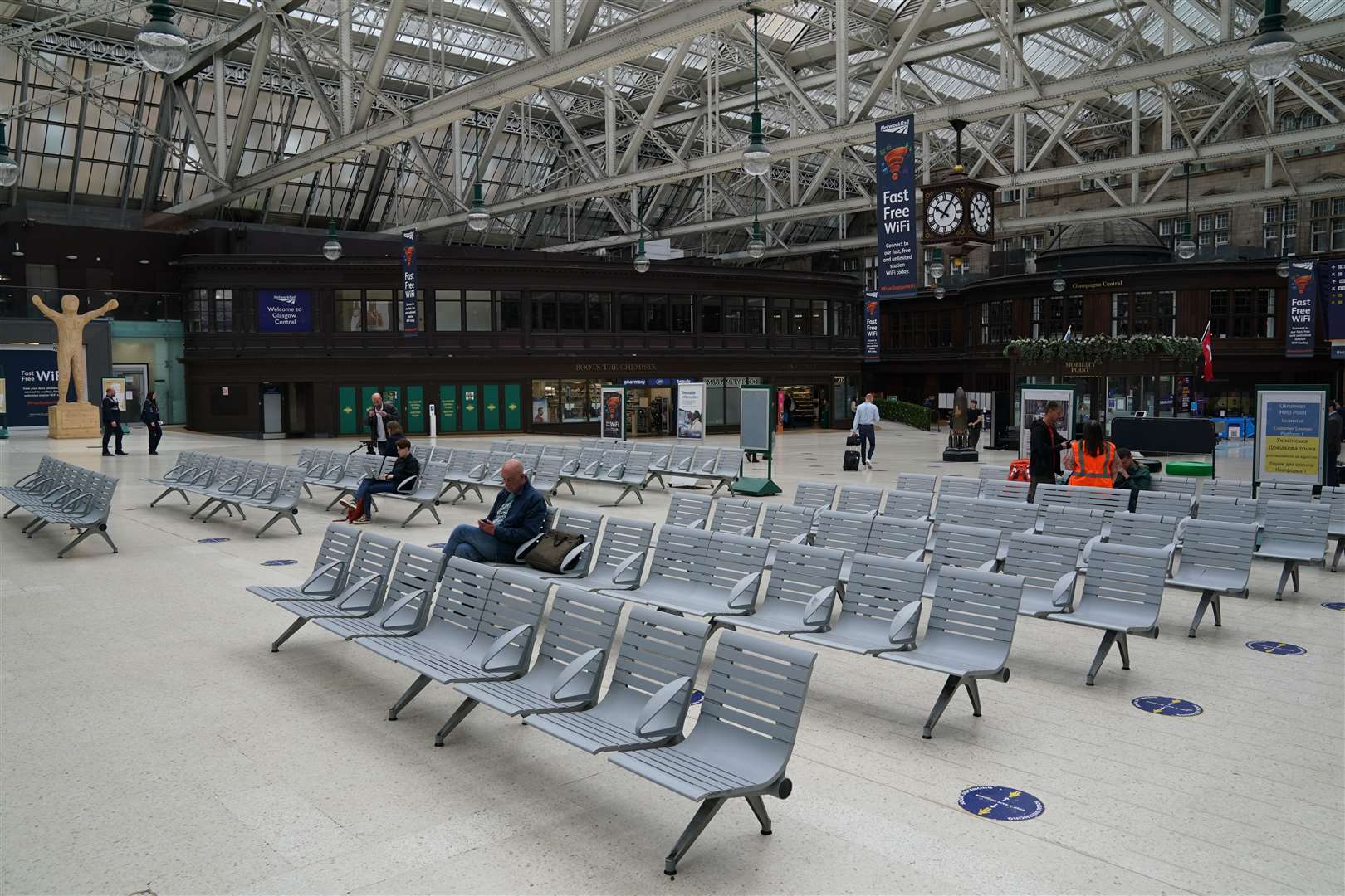 Glasgow Central Station lies almost deserted on Tuesday (Andrew Milligan/PA)