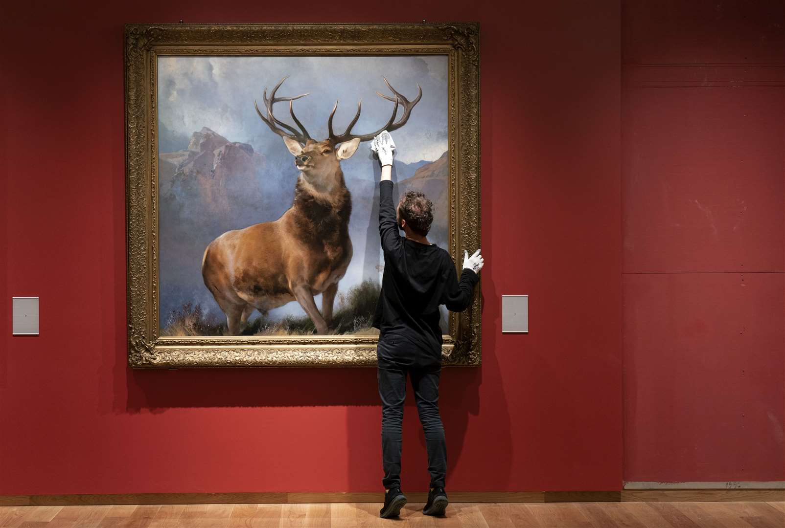 The Monarch of the Glen painting by Sir Edwin Landseer is moved to its new home (Jane Barlow/PA)
