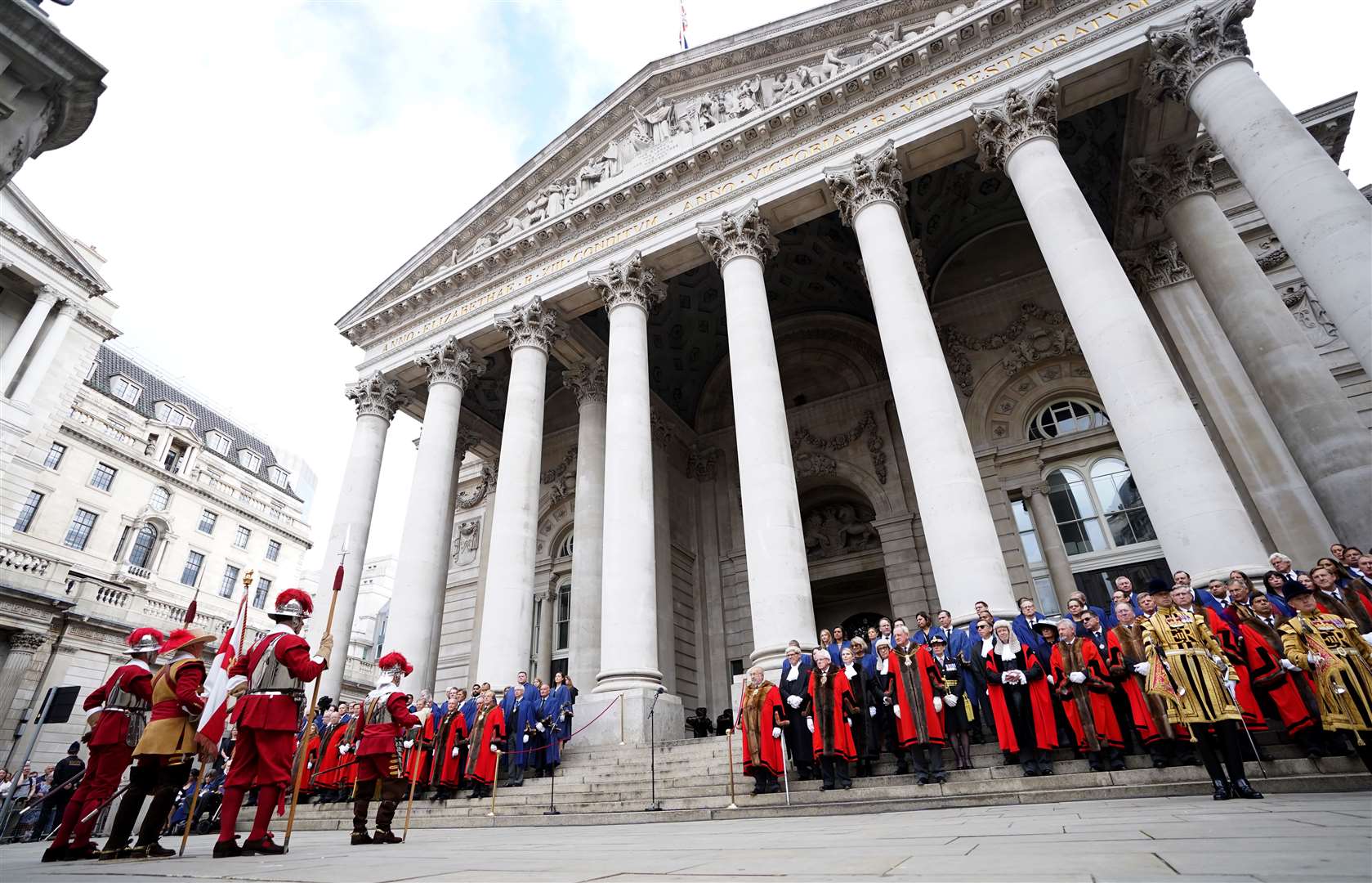 Pikemen of the Honourable Artillery Company, left, stand outside the Royal Exchange in the City of London, before the reading of the Proclamation of Accession of King Charles III (James Manning/PA)