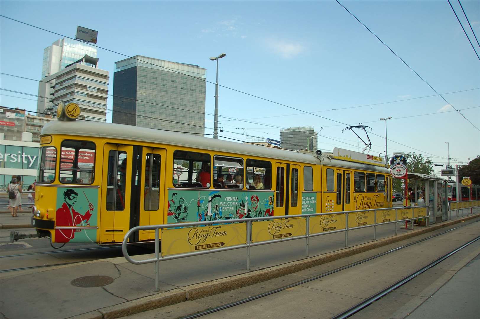 The yellow tourist tram at Schwedenplatz ready to set off on another tour around Vienna.