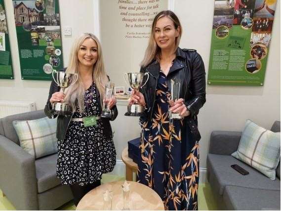 Strictly Inverness organisers Emma Nicol and Wendy Morgan getting the trophies ready for the Strictly Inverness competition.