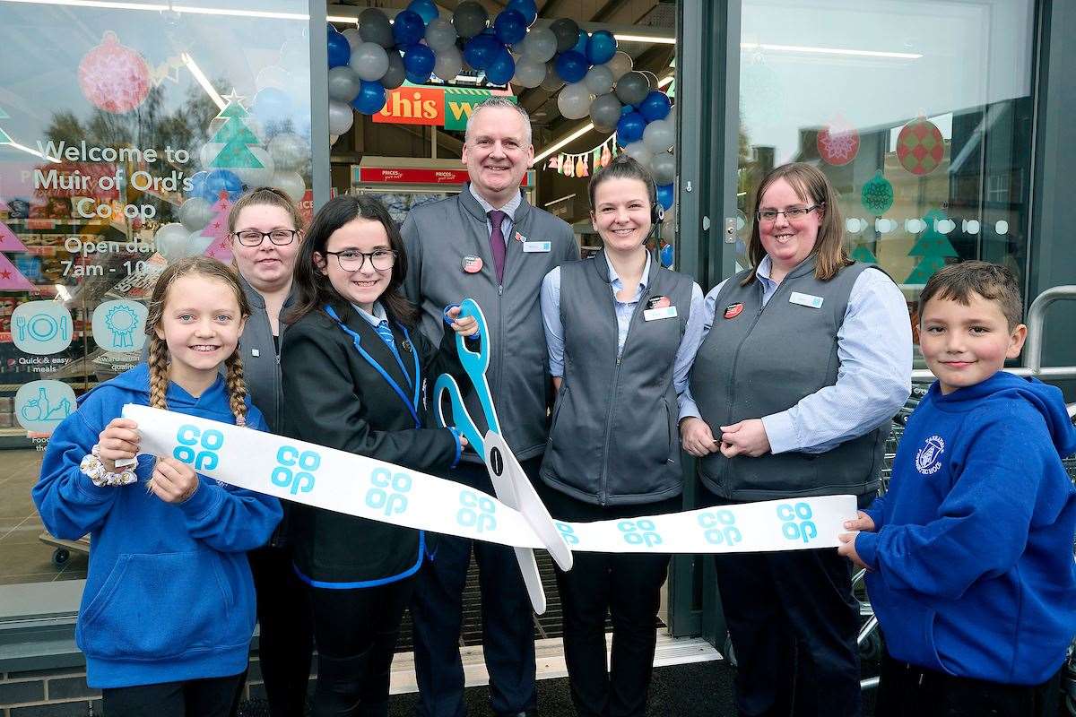 Co Op, Muir of Ord opening day. Ribbon Cutting Tarradale Primary Pupils LtoR Ava Millar (9) Ailsa Moran (10 Head Girl) and Ramsey Ebrihem (8) with Britney Macphee (CTM), Daniel Simpson (Coop Operations Manager), Martin Brant (Store Manager), Katie Gontier (Team Leader), Phyllis Hannah (CTM) and Lynn Mackenzie (Team Manager).