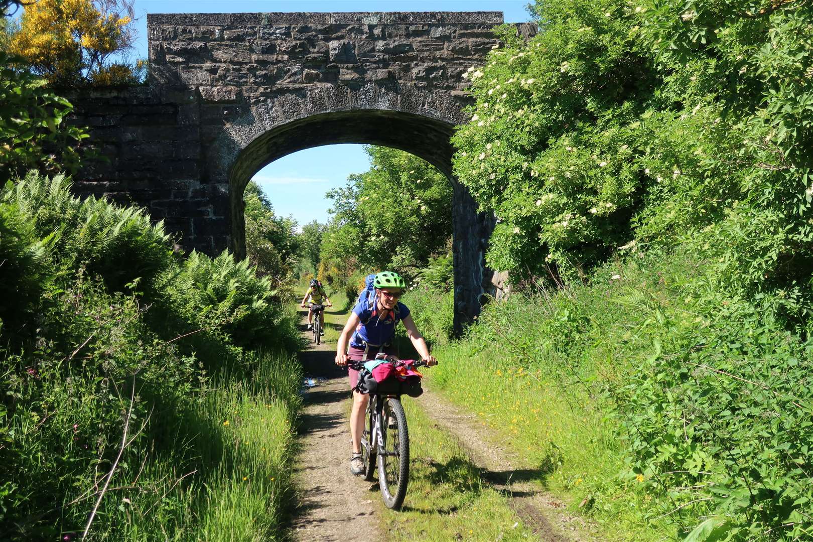 Laura and Sarah enjoying the sunshine on the old Forres to Grantown railway route.