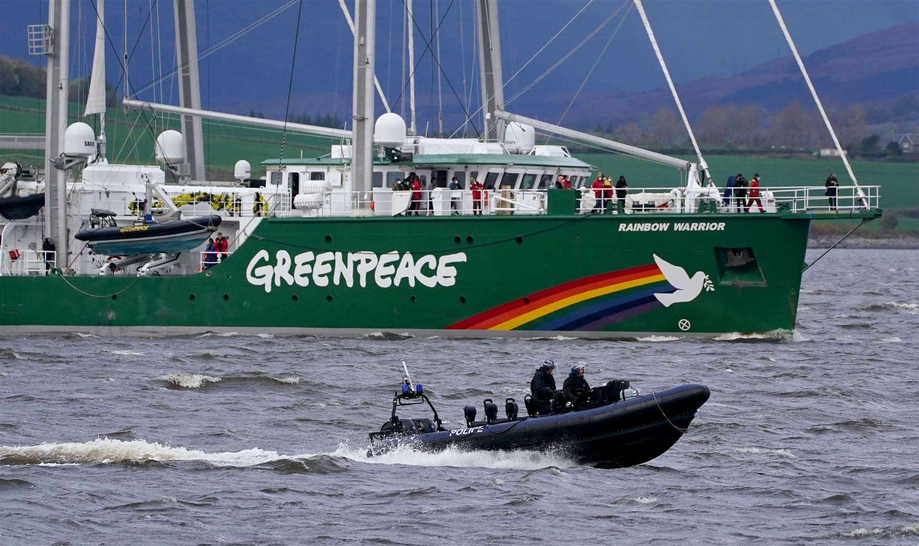 The Greenpeace ship Rainbow Warrior makes its way up the Clyde (Andrew Milligan/PA)