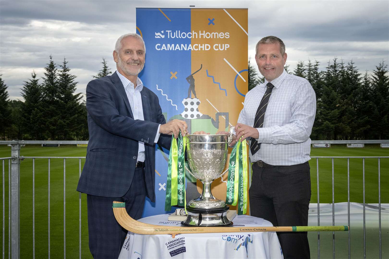 Managing Director Sandy Grant of sponsors Tulloch Homes and Steven MacKenzie, President of the Camanachd Association. Picture: Neil Paterson
