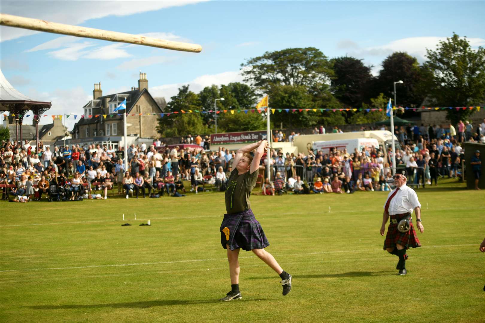 Robert tossing the caber. Picture: James Mackenzie.