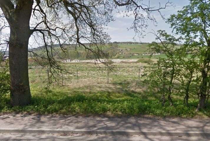 The site has been fenced off for some time following earlier work to scrape the site and building access roads, work which was left unfinished. Picture: Google Street View.