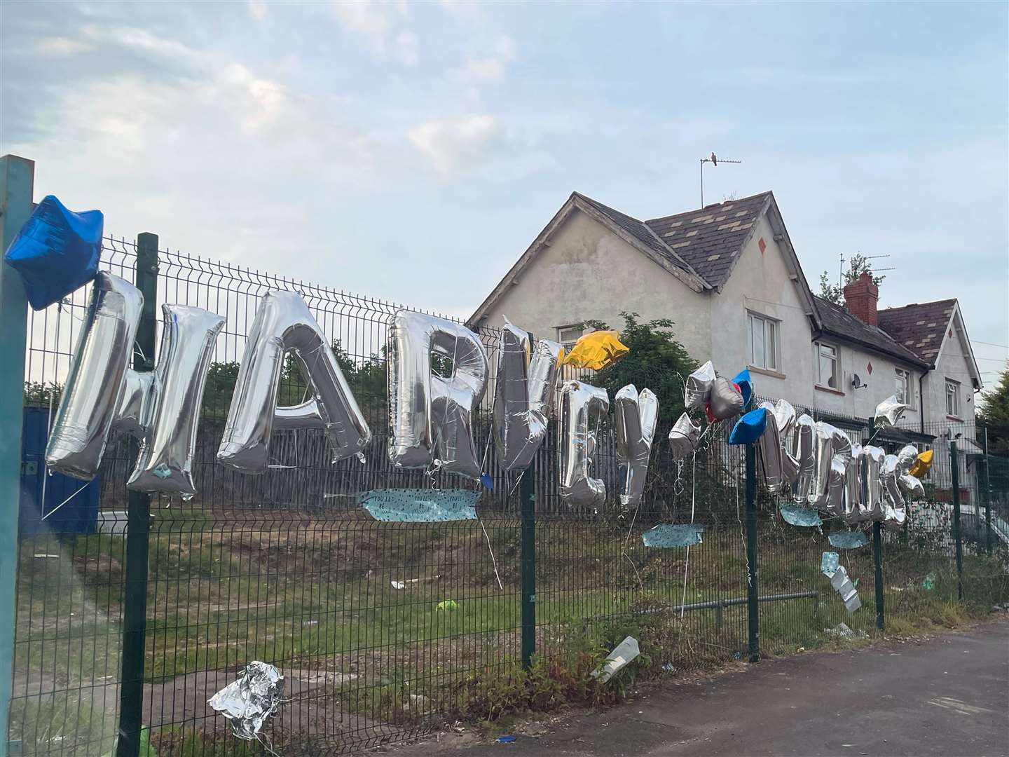 Tributes left for the two teenagers at the scene (PA)