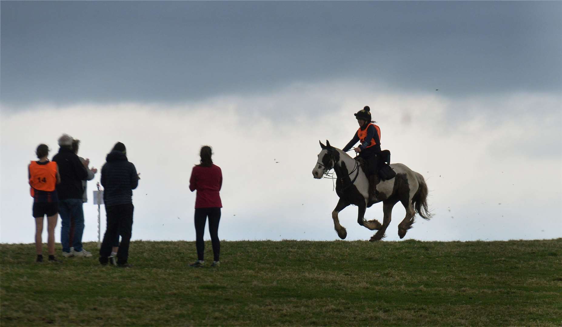 A competitor comes over the hill to reach the finish. Pictures: Gary Anthony