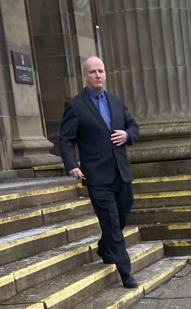 Alan Burns leaving court.