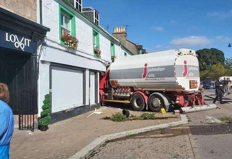 The oil delivery vehicle crashed into a shop and houses in Beauly. Picture: Emily Purvis.