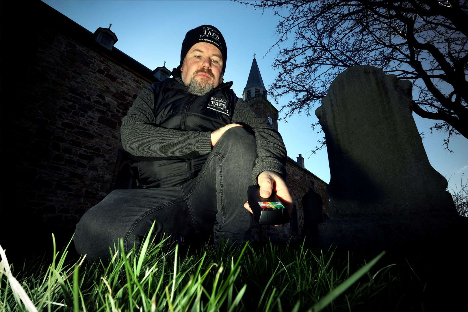 Liam Shand, co-founder of Highland Paranormal in the grounds of Old High Church.  Photo: James Mackenzie