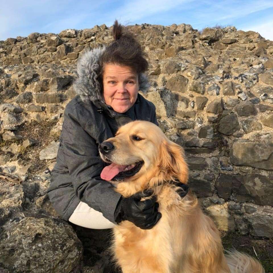 Blind runner Sam Fox, 52, from Benfleet, Essex, with her guide dog Winston (Sam Fox/PA)