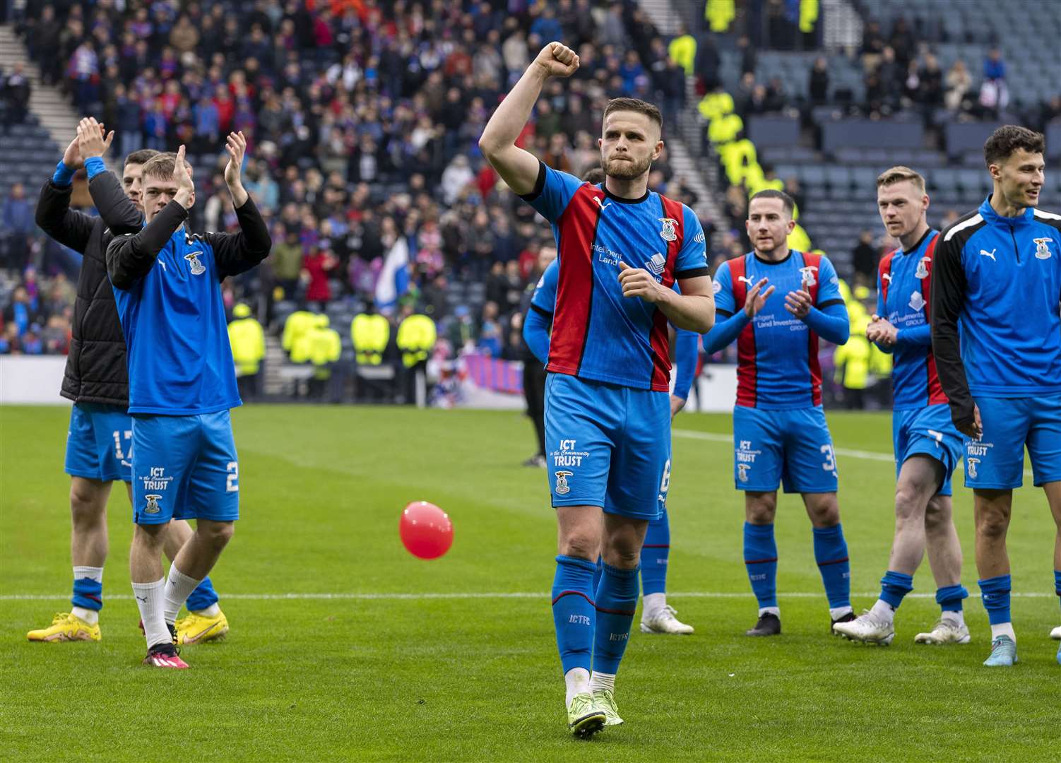 ICT’s Danny Devine leads the players’ applause after the semi-final win at Hampden. Picture: Ken Macpherson