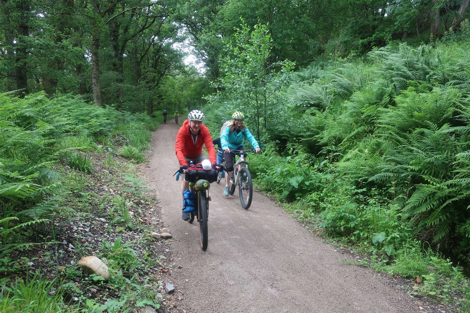 Jim and Meg cycling on the newly surfaced trail.