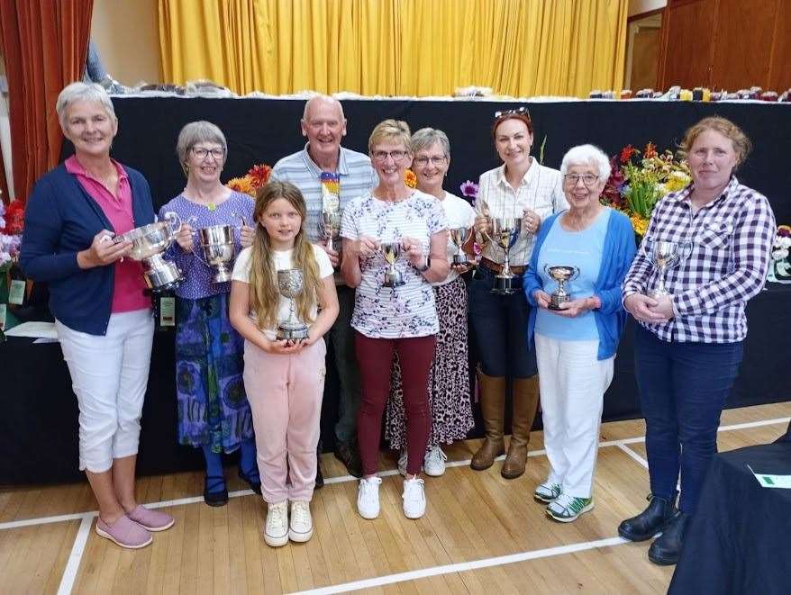 Trophy winners after the presentation – (L to R) Annette MacArthur, Fortrose; Susan Seright, Rosemarkie; Maisie McFadyen, Renfrew; Bruce Begg, Tain; Rhona Begg, Tain; Julie Sellar, Fearn; Lou Gray, North Kessock; Moira Anderson, Avoch; and Angela Aird, Cromarty.