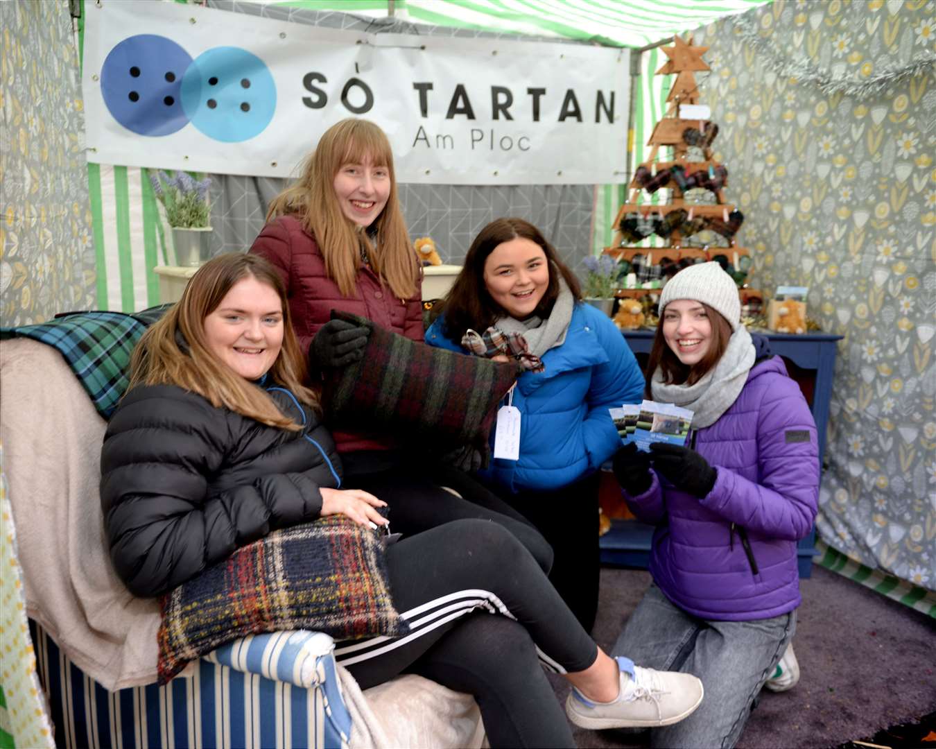 Freya Fowler, Anya Adams, Gracie Hammond and Cara Slaughter from Plockton High School were selling tartan cushions and tartan heart Christmas tree decorations.