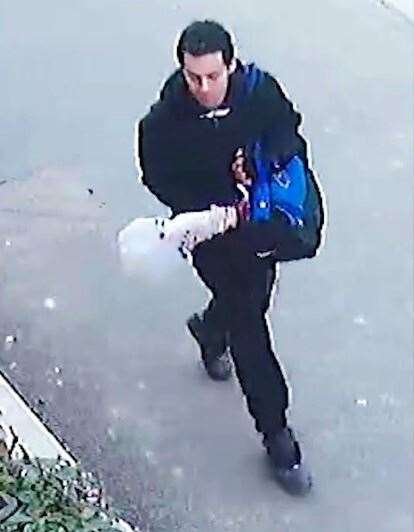 Callum Wheeler walking with a blue holdall taken from CCTV (Kent Police/PA)