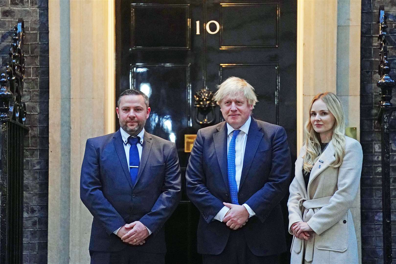 Sgt Andy Fiddler supports Lissie Harper, the widow of Pc Andrew Harper, as she meets Boris Johnson (Victoria Jones/PA)
